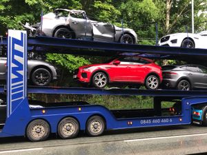 Supporting image for story: Luxury cars damaged as car transporter hits bridge in Shrewsbury