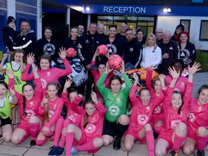 Supporting image for story: Telford schoolgirl footballers in the pink as group donates £400 kit