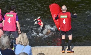Splash! A racer capsizes near the pontoon