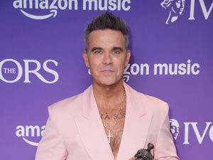 Supporting image for story: Robbie Williams announces run of shows to coincide with Britpop album release
