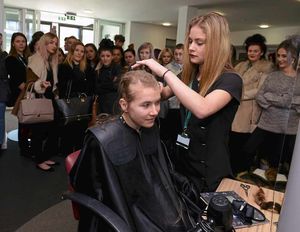 Phoebe during the head shave