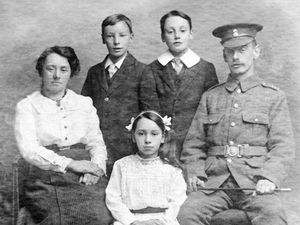 Supporting image for story: Family snap during the maelstrom of war