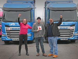 Alex Jeavons (middle) with the HGV School iN Willenahll general manager Kate Sanders (L) and Driver trainer Sukhjit SIngh (R).