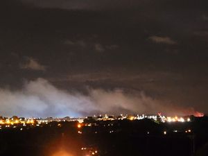 Supporting image for story: One woman taken to hospital as firefighters battle through the night to get large Brierley Hill fire under control