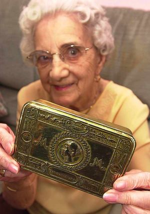 Clarice Onions, from Whitmore Reans, Wolverhampton with her father's copper cigarette box from the First World War.