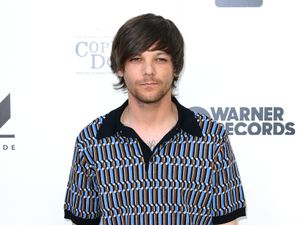 Supporting image for story: Louis Tomlinson forced to reschedule events after breaking arm in fall