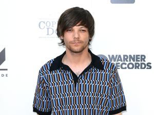 Supporting image for story: Louis Tomlinson forced to reschedule events after breaking arm in fall