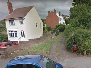 Supporting image for story: Sink hole appears in Dudley alleyway