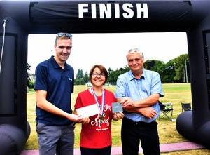 Winner in the 400m swim and 5k run Female 50+ - Mary Morton with Scott Humphreys - Manager, Jewson Builth - one of our corporate sponsors and Builth Wells Deputy Mayor Councillor Alan Waller. Image by Ted Edwards Photography