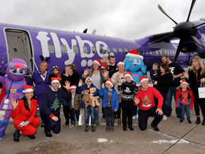 Supporting image for story: Acorns Hospice children meet Santa on magical Christmas flight