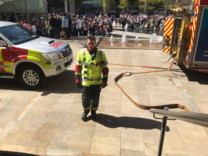 Supporting image for story: Hundreds of people gather outside Birmingham's Brindleyplace after 'burning smell' in office
