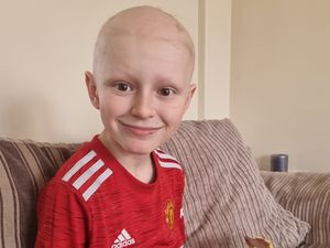 Supporting image for story: Kayden, 9, given medal for strength amid stress and health trouble