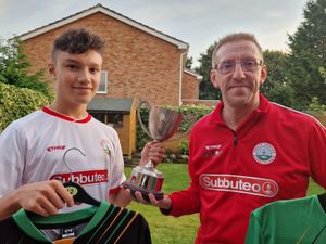Justin and son Alex (left) have been playing Subbuteo together for almost a decade