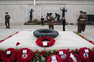 Members of the military pay their respects following an Armistice Day service, marking the anniversary of the end of the First World War, at the Armed Forces Memorial in the National Memorial Arboretum. Photo: Jacob King