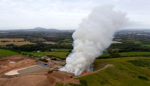 Smoke rising from the site. Photo © Sam Bagnall