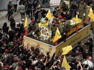Supporting image for story: Israel bombards Hezbollah, killing a top commander, while families flee Lebanon