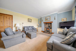 Inside the property. Pictured is a reception room with a log burner. Picture: Davie Parry & Co/Rightmove.