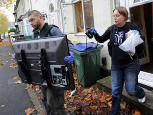 Supporting image for story: TVs seized in police raids on homes