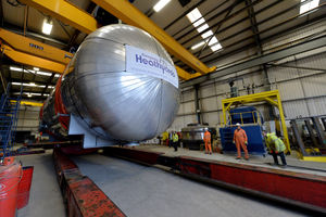 The massive 60 tons load being lowered on to the special reinforced trailer