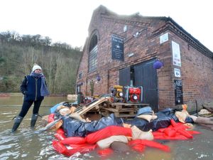 Supporting image for story: Flooded Ironbridge shops pumping water around the clock and holding out for 'a glimmer of hope'