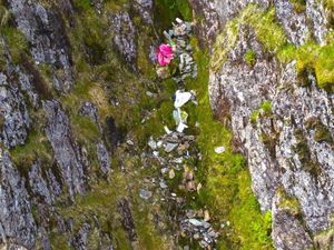 Supporting image for story: 'Waterfall' of rubbish cascades down Mount Snowdon including drinks bottles and Santa hats