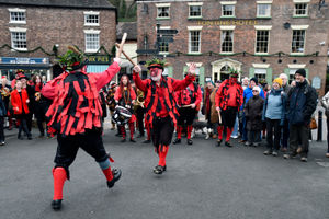The Ironmen and Severn Gilders Morris dancers perform in Ironbridge.