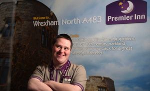 James Lewis on a poster for Premier Inn