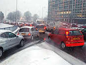 Supporting image for story: Gridlock in snow havoc