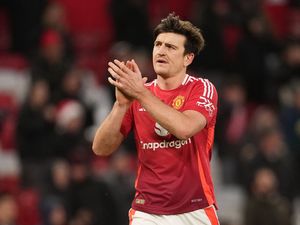 Supporting image for story: Ruben Amorim will ‘happily’ trigger option to keep Harry Maguire at Man Utd
