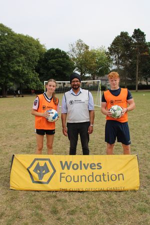 Warinder Juss MP and two young participants of the Kicks in the Park initiative
