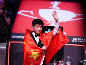 Zhao Xintong celebrates victory in the World Snooker Championship