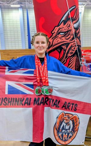 Emma with her 3 silver medals