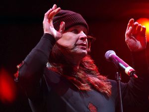 Ozzy Osbourne performing on stage, during his Ozzfest annual rock music festival at Donington Park, in Leicestershire