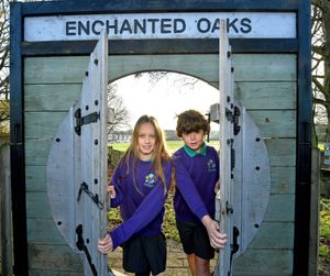 Olivia Bocian, aged 10, and Henry Lunt, aged 10, at the entrance to the Enchanted Oaks outdoor learning area