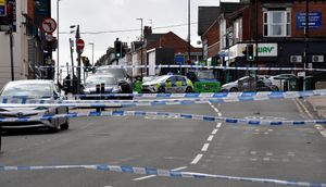 The scene on Bearwood Road, Smethwick after a man was shot 