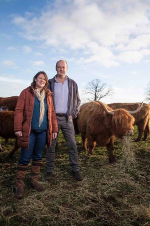 Clare and Ian Mainwaring with their Highland Cattle