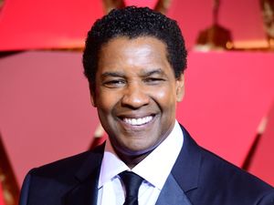 Supporting image for story: Denzel Washington accepts Lifetime Achievement award on CinemaCon opening night
