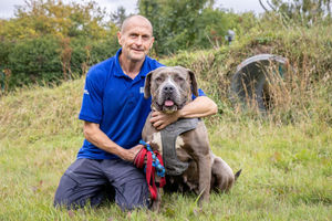 Bella is now looking for her forever home with a loving family. Pictured here is Bella with Animal Care Assistant David Tarbar