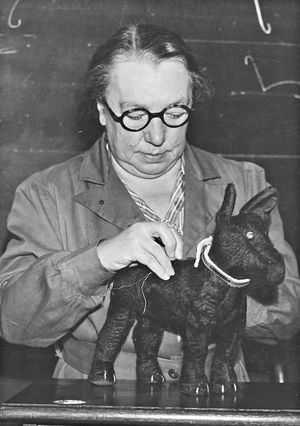 A handmade Corgi toy by A. E. Ward. This was to be presented to the Duke of Edinburgh to be given to the newborn baby, Prince Charles, in 1948.