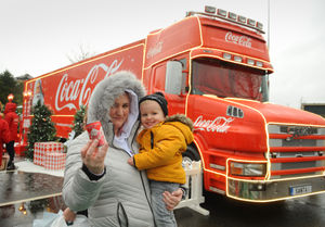 Rachel Willetts, and two-year-old Mason Keen, both of Stourbridge next to the truck.