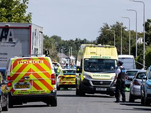 Supporting image for story: Teacher tells inquiry of hiding with child in toilet as attacker banged on door