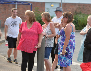 Spectators waiting for the Queen's Baton Relay, at Shrewsbury Sports Village 
