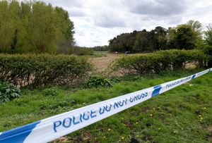 Blue police tape at the scene