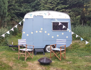 There are a range of accommodations, including a caravan. Photo: Himley Glamping