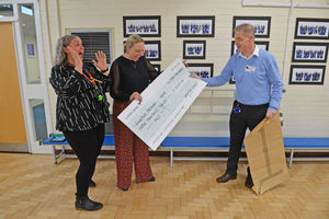 Longford Primary Academy in Cannock came second in our Cash for Schools competition. Pictured: admin officer Michelle Davis and headteacher Louise Lawrence with sponsors and pupils.