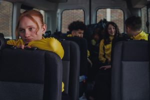 Girl feeling lonely on bus.