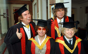 Dave Hill, Jim Lea, Don Powell and Noddy Holder collect their honorary followships from the University of Wolverhampton in 2002
