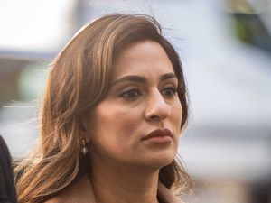 Supporting image for story: Teacher who held coconut placard of Sunak and Braverman found not guilty