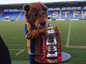 Supporting image for story: Shrewsbury Town (well, Lenny the Lion) get their hands on the FA Cup