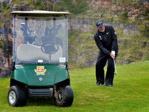 Supporting image for story: Rain fails to stop play as Botham swops a bat for a golf club in charity round